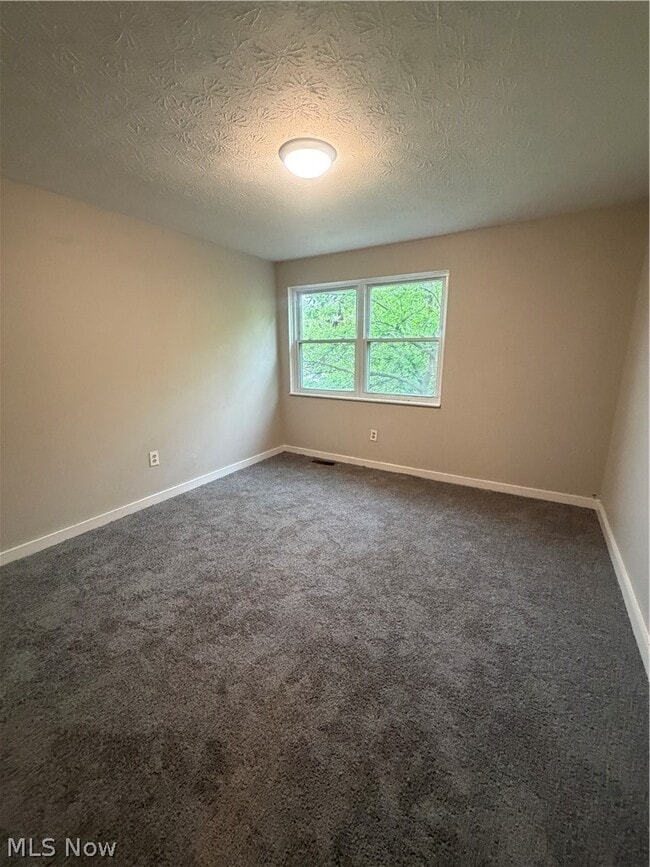 Building Photo - 9409 Manor Ave