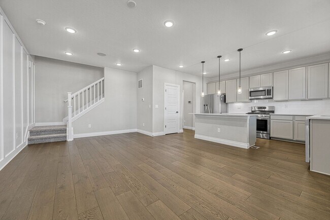 Building Photo - Former Model Home - Superb townhome in great location!