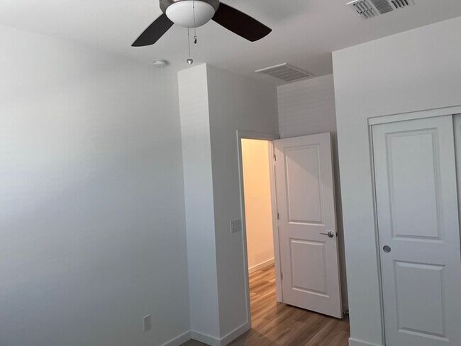 Building Photo - TOWN HOME WITH COMMUNITY POOL , GATED COMM...
