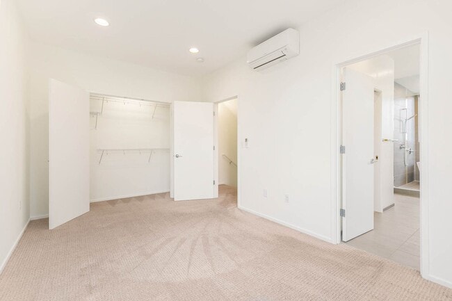 Building Photo - 3 Bedroom Modern Industrial Townhome with City Views & Rooftop Oasis