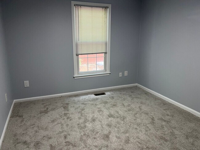 Building Photo - Stunning Three Finished Level Townhome Clo...