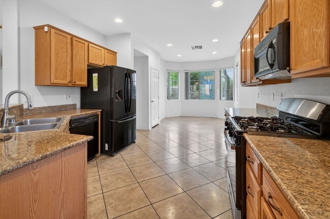 Building Photo - CORNER LOT 4-BEDROOM HOME + LOFT  WITH 3.5 BATHS AND 3-CAR GARAGE!