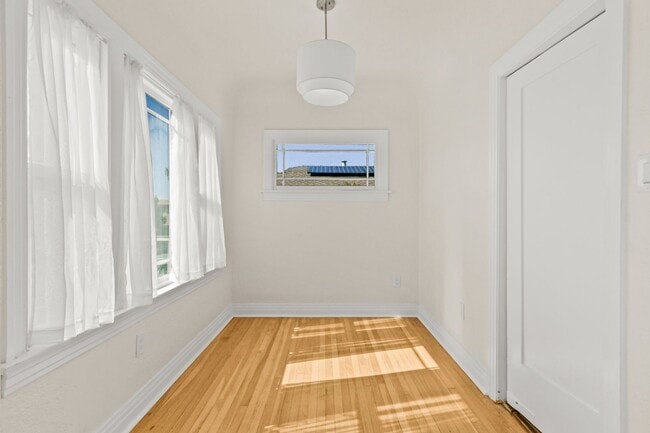 Building Photo - Move In Special!!  Elevated Golden Hill 2BR with Southwesterly Views with A/C & Detached Garage
