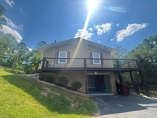 Building Photo - Fully Updated 2BR with Garage, Fenced Yard & Prime Johnson City Location
