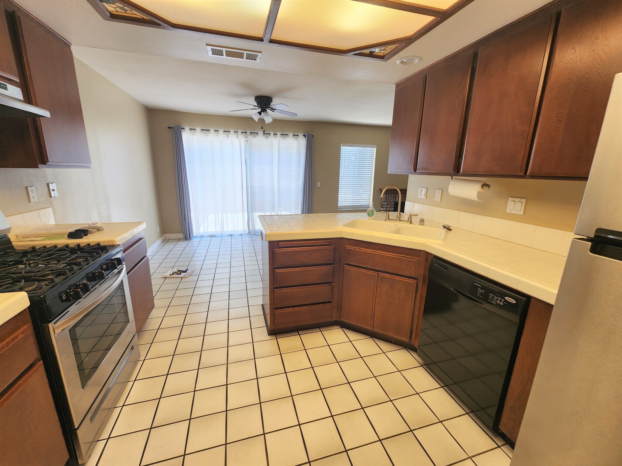 Kitchen with Refrigerator & Dishwasher - 630 W Palm Ave