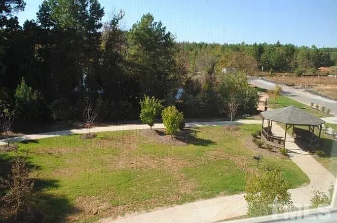 Home backs to common area, trees/lake view - 2908 New Hill Park Rd