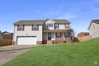 Building Photo - Pet Friendly Three Bedroom with Bonus!