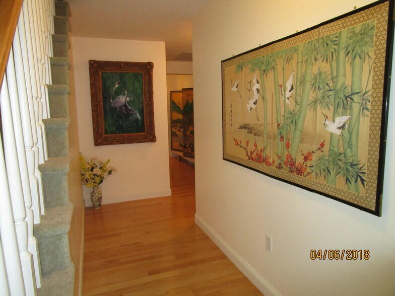 hallway outside bedroom 2 with stairs to third floor family room - 103 Summer St