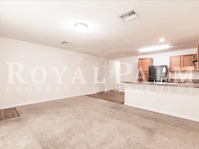 Building Photo - Your Season to Settle In – 3BR/2BA Duplex in Vistanna Villas, Lehigh Acres with Space, Style & St...