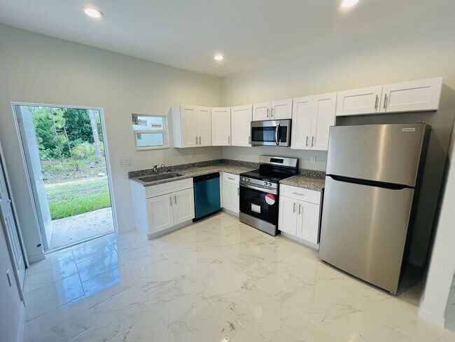 Building Photo - MOVE IN SPECIAL- ONE MONTH FREE!!-BRAND NE...