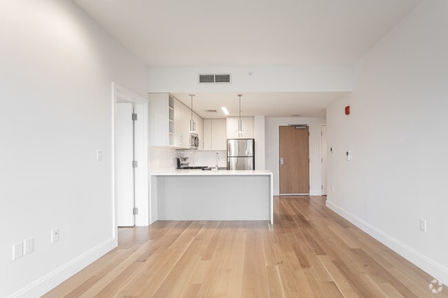 3BR, 2BA - Living Room/ Kitchen - Camden Street Apartments