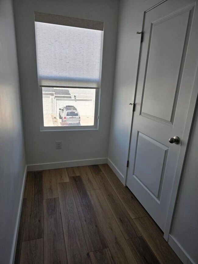 Building Photo - Nearly New, Well Appointed Modern Townhouse w 2 car attached garage