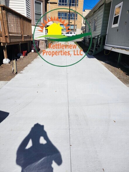 Cement Shared Driveway: NEW - 707 State Street