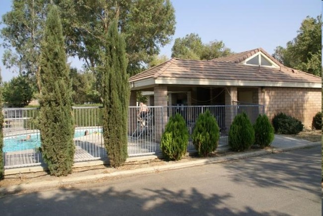 Building Photo - Almond Tree Oasis Park