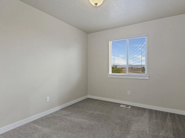 Building Photo - Spacious 4-Bedroom Home with 3-Car Garage