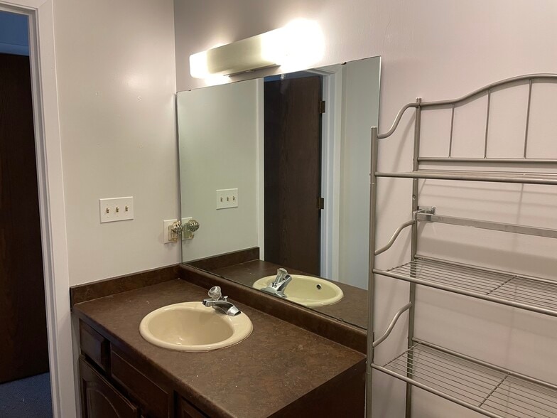 Full bathroom With tub and shower - 1209 E 4th St