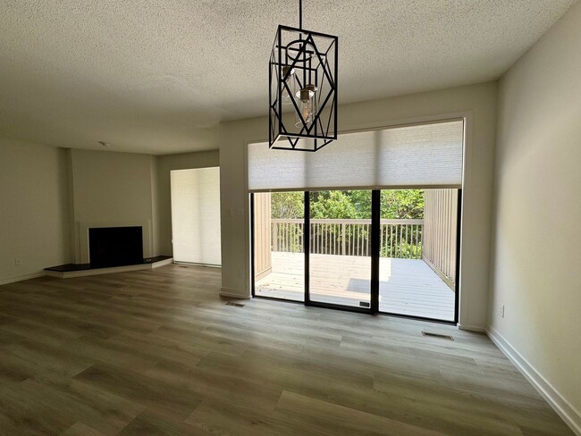 Building Photo - Spacious 2-Story Falconbridge Condo with Private Courtyard and Resort-Style Amenities