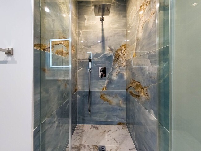 Building Photo - High-End Living Starts Here – Custom Finis...