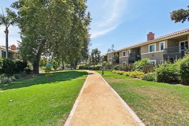 Building Photo - 7565 Charmant Dr