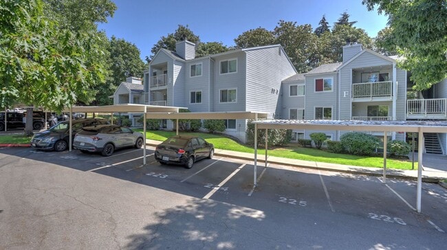 Building Photo - This ground floor corner-unit condo