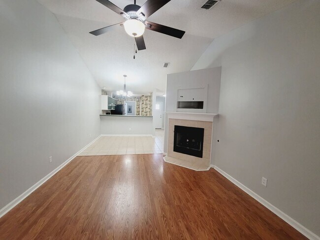 Building Photo - LOVELY 3/2 w/ Screened Porch, New Carpet in Bedrooms, Washer/Dryer, & Privacy Fenced Yard! Includ...