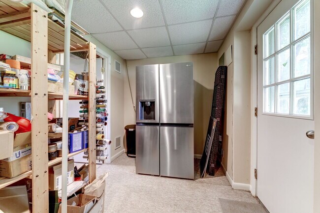 Storage area outside utility room w/exit to rear yard! - 10108 Donegal Ct