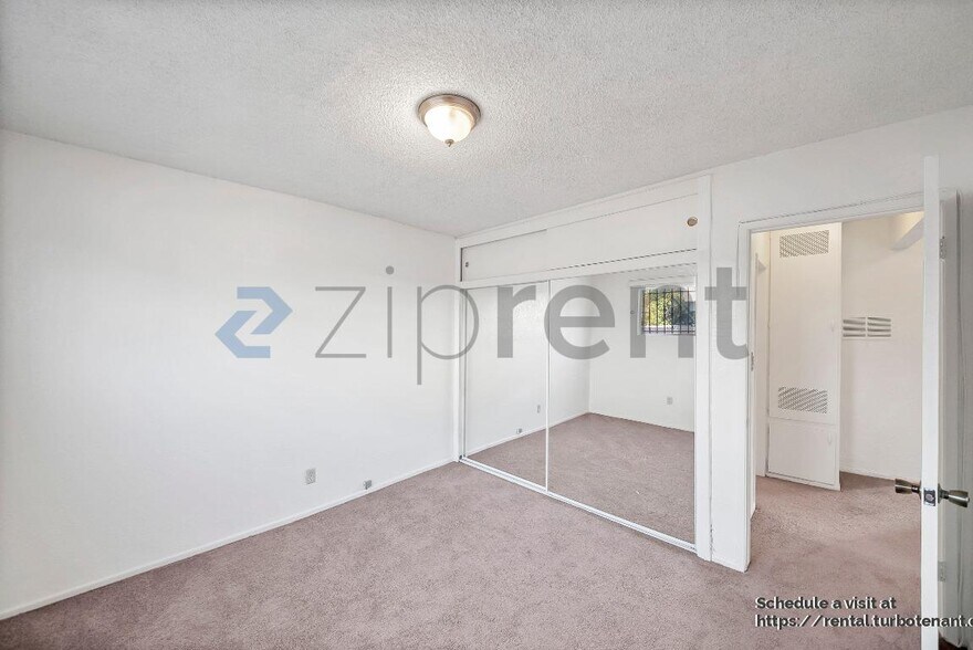 Building Photo - 2458 Normandie Ave