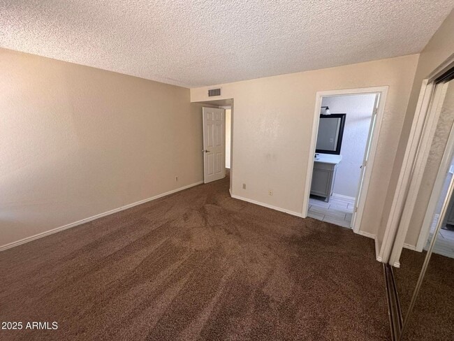 Building Photo - 3 bedroom at Peoria & 59th Ave