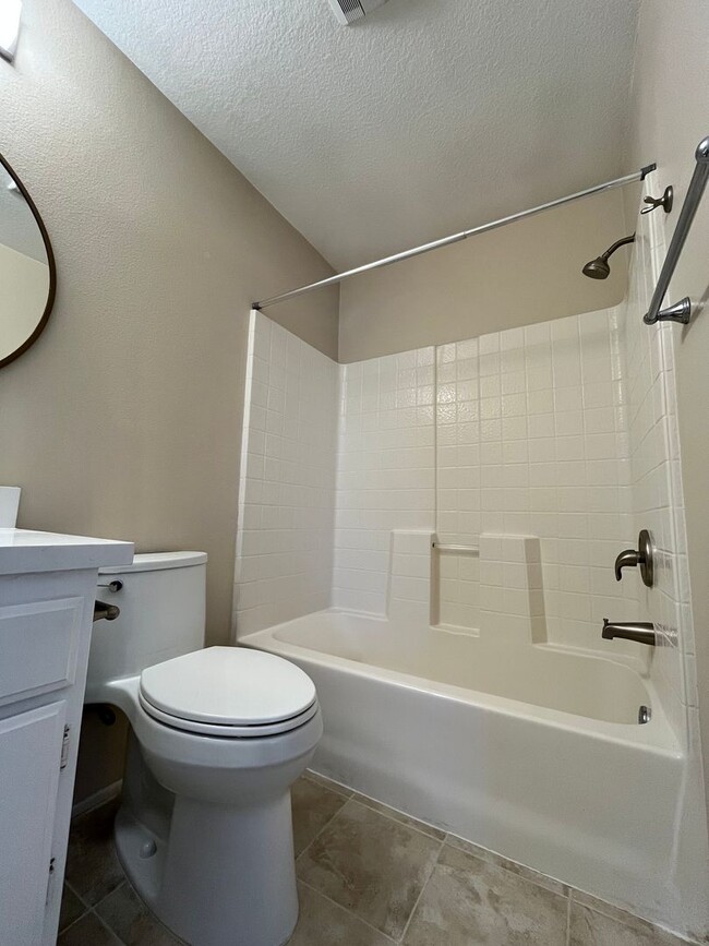 Building Photo - PICTURE PERFECT!  3 BR/3 BA END UNIT CONDO with DIRECT ACCESS 2 CAR GARAGE