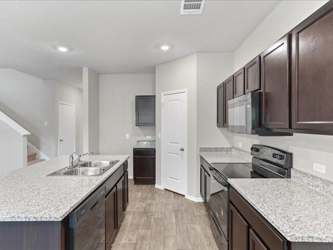 Building Photo - 6305 Wideleaf Dr