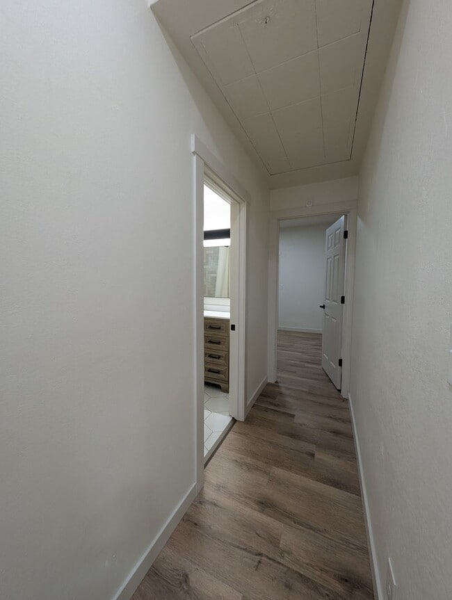 Building Photo - Adorable Four Bedroom w/ Fenced Yard Avail...