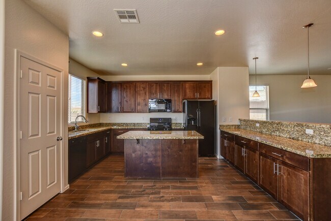 Building Photo - 3 Bedroom + a Den For Rent In Pronghorn Ra...