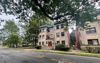 Building Photo - 4 Bedrooms 2 Bath Apartment with Heat and Hot Water Included!!