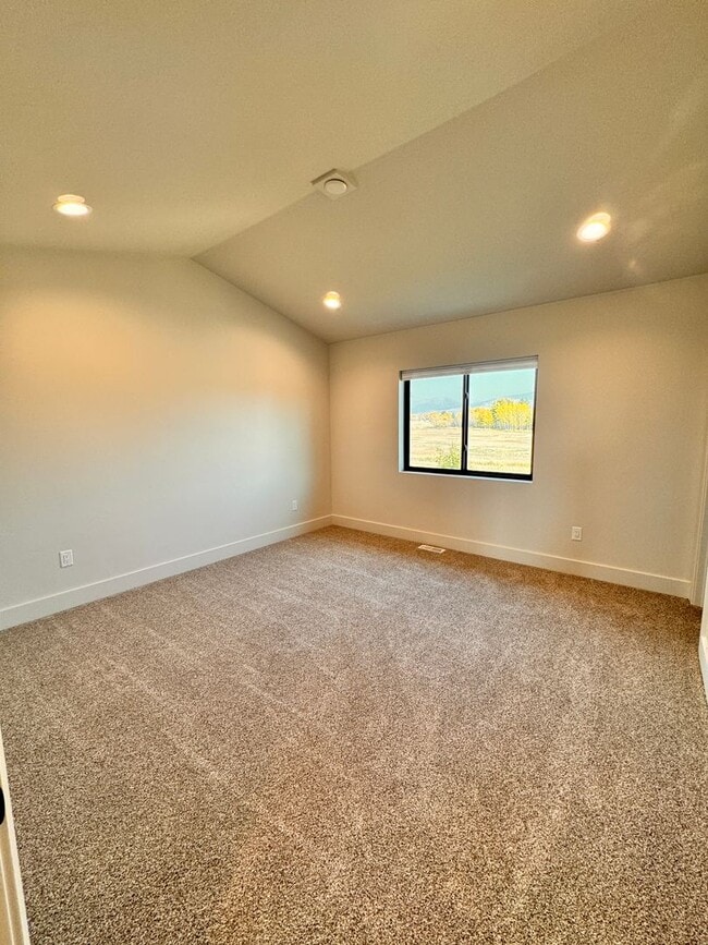 Building Photo - Modern, Spacious 3-Bedroom Townhome in the...