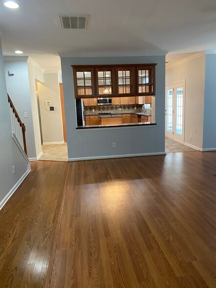Living-room with view of kitchen - 10102 Glenburn Ln