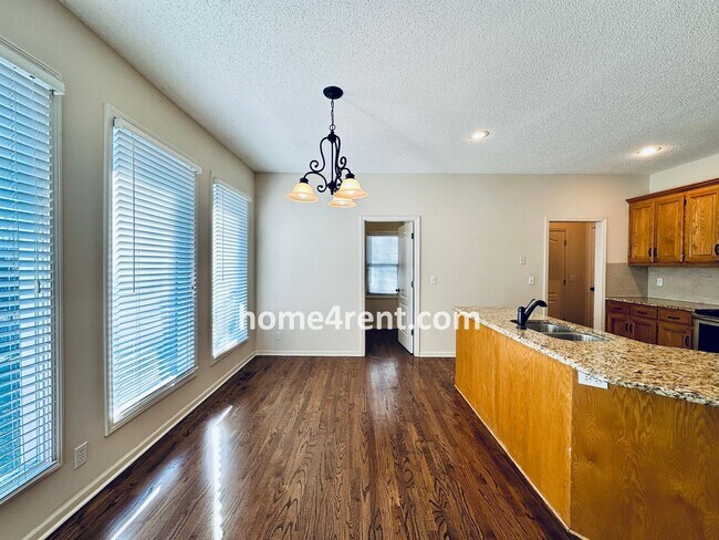 Building Photo - Blue Valley Northwest home on a cul-de-sac w/ granite counters, ss appliances and fenced yard!