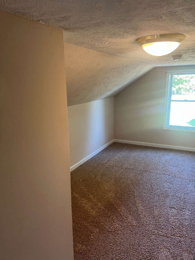 Building Photo - Charming 2-Bedroom Home Plus Bonus Attic S...