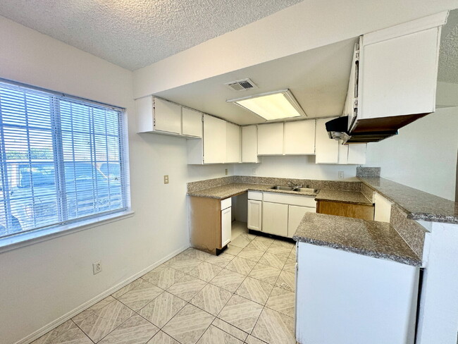 Building Photo - DOWNSTAIRS CONDO | RECENLY REHABBED 2 BEDROOM 1 BATH | ACROSS FROM CSN CHEYENNE