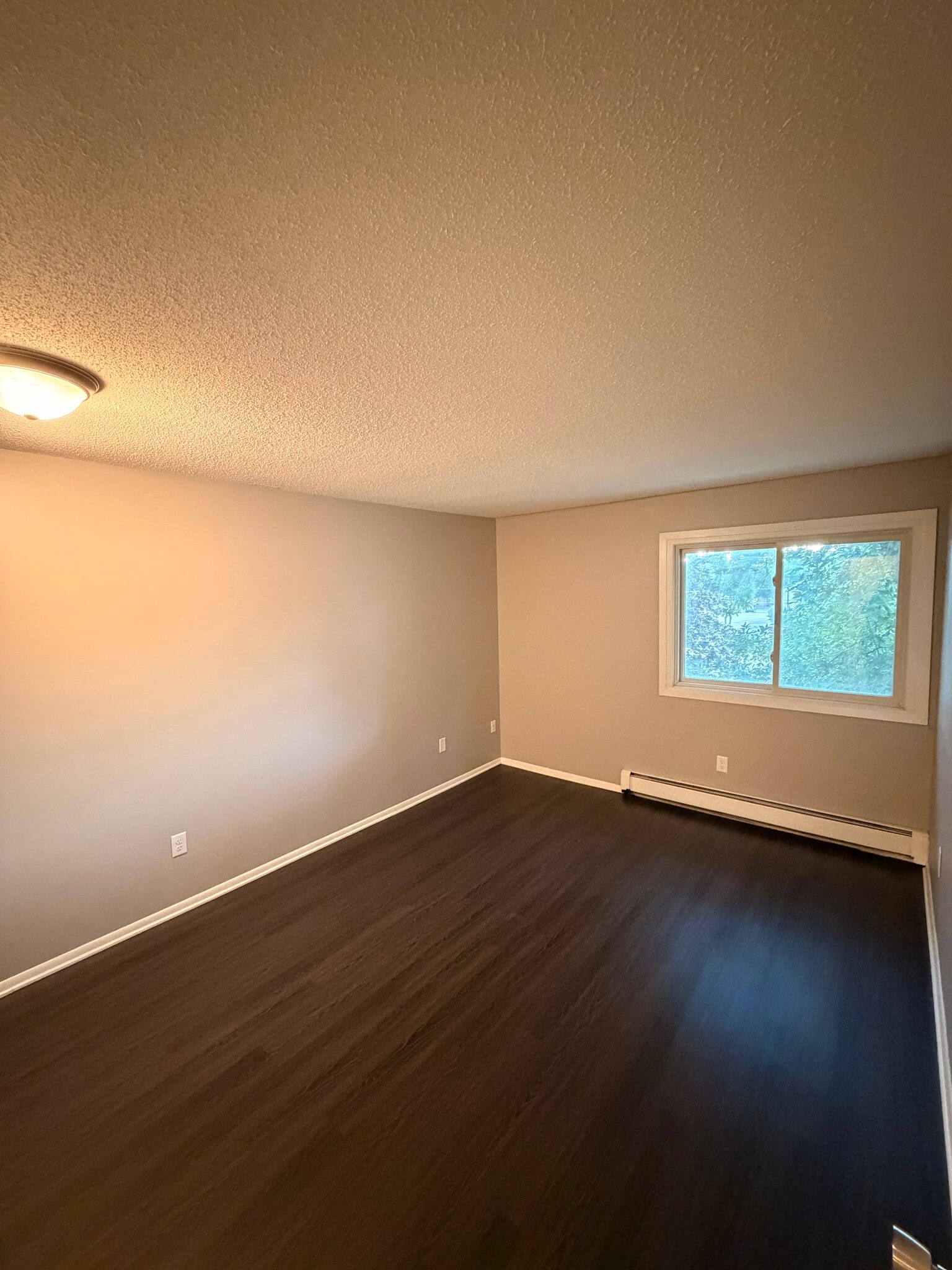 View into 2nd bedroom from door. - 8935 Old Cedar Ave S