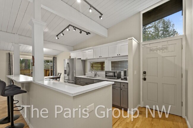 Building Photo - Fantastic Modernized Bridle Trails Mid Century Home * Central A/C, EV Charger, Exceptional Outdoo...