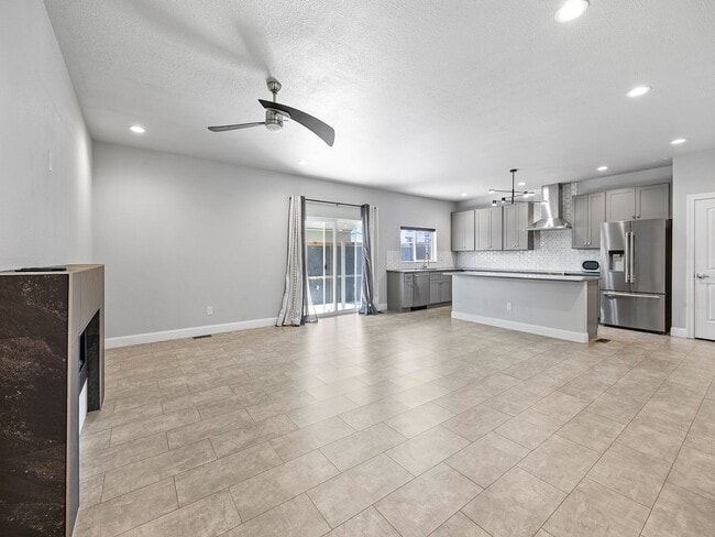 Building Photo - 4-Bedroom Townhome with Finished Basement, Garage & Private Outdoor Space