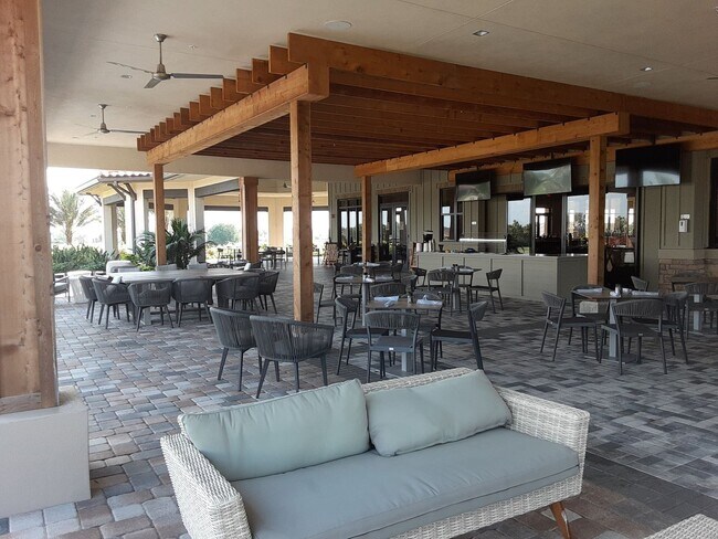 Building Photo - Short term turnkey furnished Incredible 2/2 with den ground floor condo in resort Esplanade Lakew...