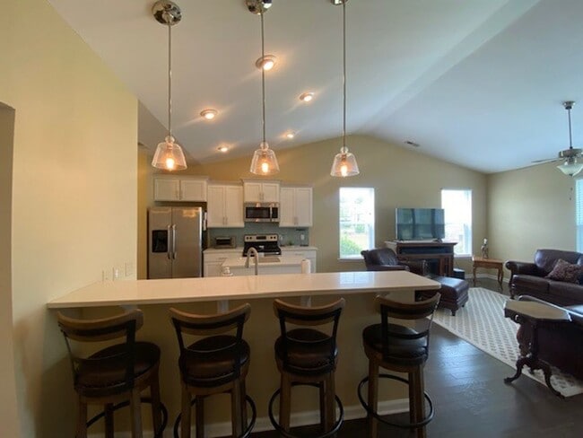 Building Photo - Welcome to this fully furnished 3-bedroom, 3-bathroom townhouse located in the vibrant Hawkeswate...