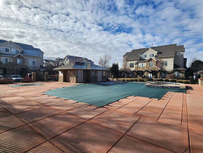 Building Photo - Spacious Two-Suite Townhome With Garage, Fireplace And Community Pool