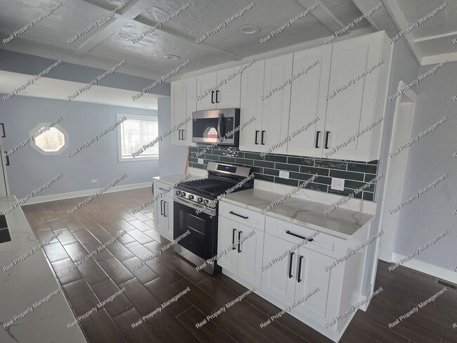 Building Photo - Completely Renovated Three Bedroom Ranch