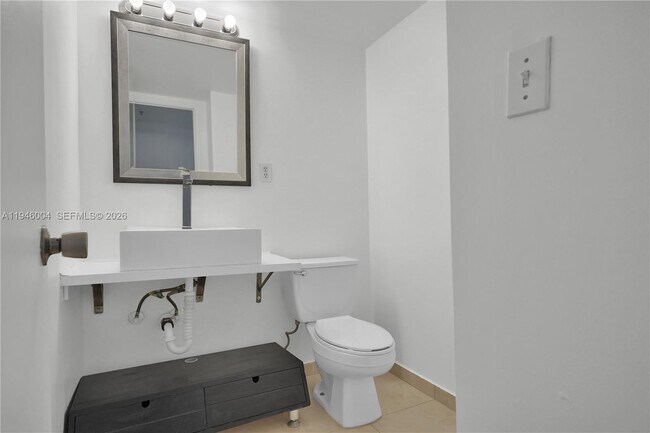 Building Photo - 19380 Collins Ave