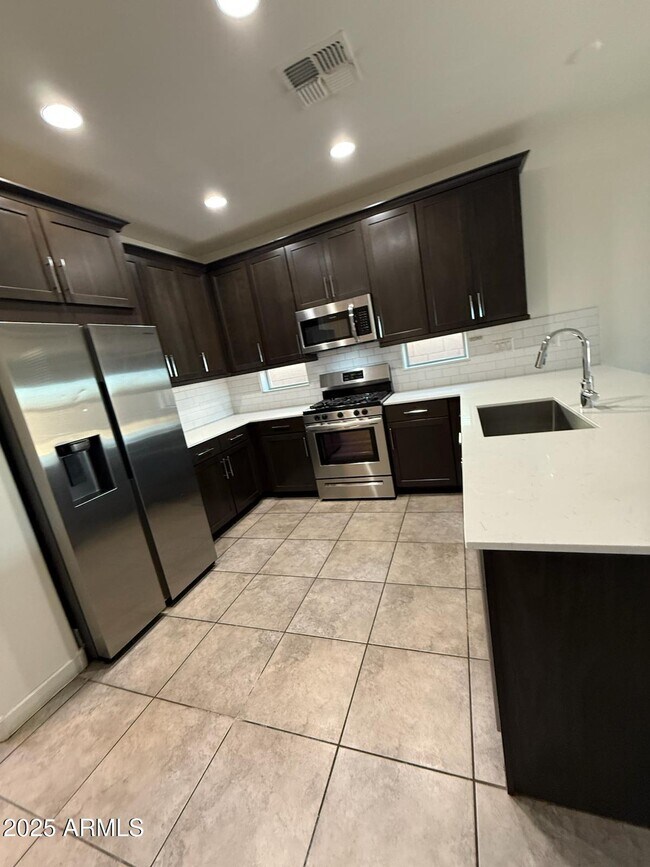 Building Photo - 3823 S 64th Dr