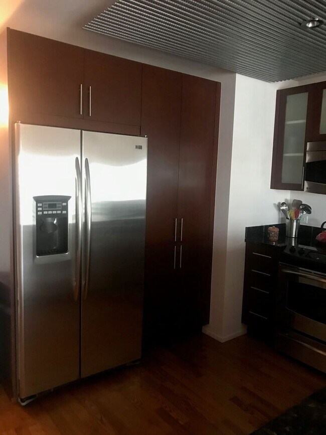 Building Photo - MONTAGE GEM With ALL UTILITIES INCLUDED