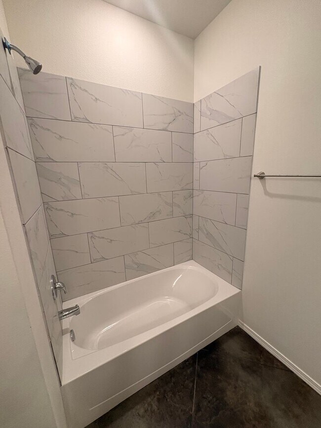 Building Photo - Stunning New 3/2 Townhomes