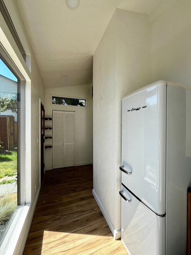 Building Photo - Modern Private Studio with Loft, Patio & Off-Street Parking